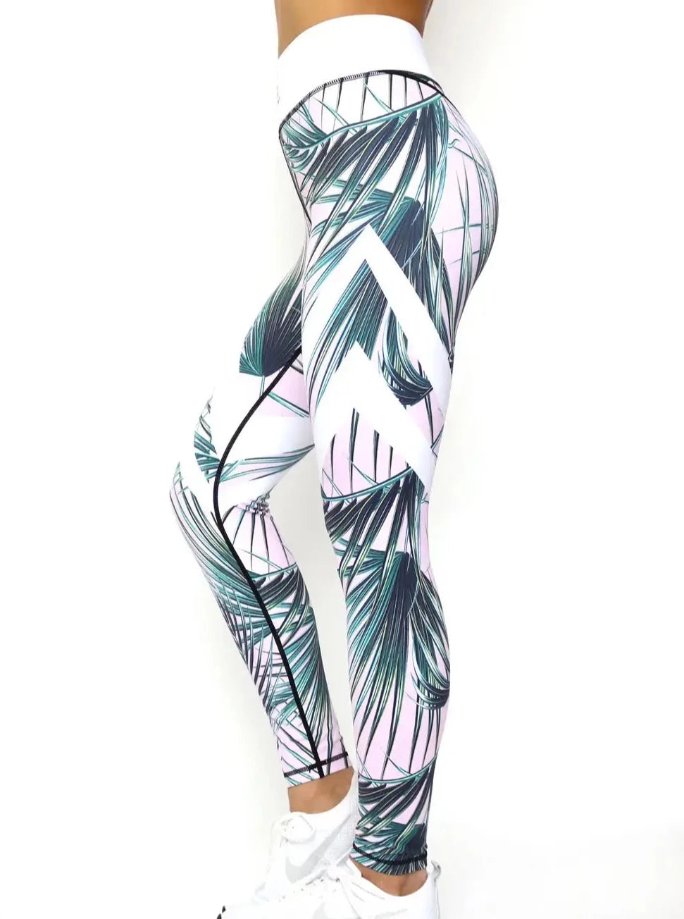 Seitenansicht von rosa Sport Leggings mit Palmen Print von raise Sportswear
